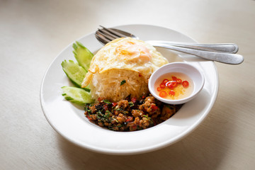 Stir fried chicken with chicken in Thai restaurant