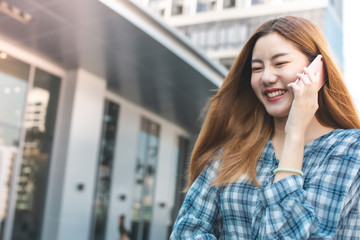 Portrait of young beautiful asian woman using smart phone selfie live in roof top. Happy asian girl online influencer blogger. vlogging talking on live stream.