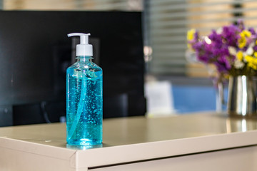 Bottle of Alcohol gel is available in an office for staff to watch hands preventing from CORONA Virus