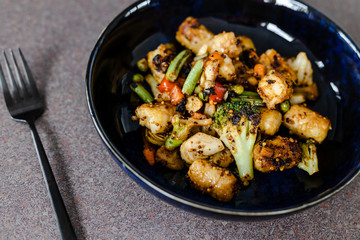 plant-based food, mixed grilled veggies with potato croquettes