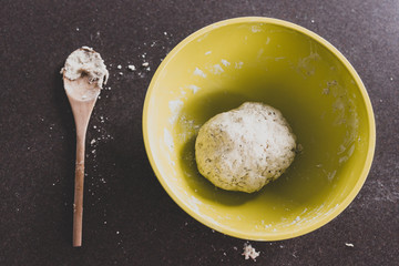 healthy homemade food, preparing homemade herbs and sesame bread by making the dough