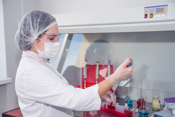 Woman medic in a lab