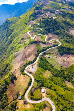 Top View Aerial Photo From Flying Drone Over Curvy Road Up Mountains And Winding Mountain Paths Exciting Steep At Phu Thap Boek ,Phetchabun Province,Thailand,ASIA.