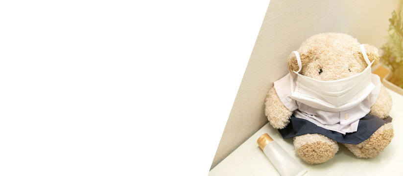 toy bears wear surgical mask for social distance away from pandemic corona virus or covid-19 during quarantine period. Health and medicine concept