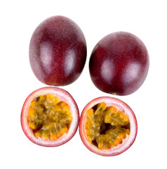 Top view Purple passion fruit with cut in half isolated on white background.