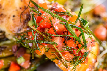 Close up to some chopped Tomato Salsa Verge