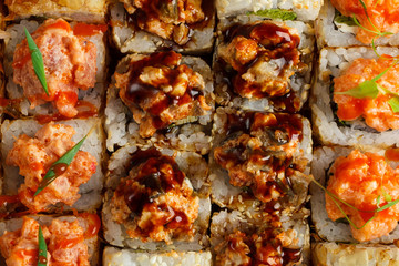 Japanese food: Set of salmon sushi and rolls with salmon and eel