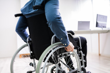 Obraz premium Businessman On Wheelchair