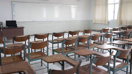 Fototapeta na wymiar Schools in Asian shutdown due to spreading of the Crononaviru or COVID-19. An empty classroom with no student.
