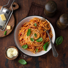 spaghetti pasta with tomato sauce  in white bowl