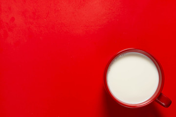 Obraz na płótnie Canvas big mash with milk on a colored background