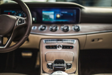 Fototapeta premium Control wheel, navigation system and meters of a car