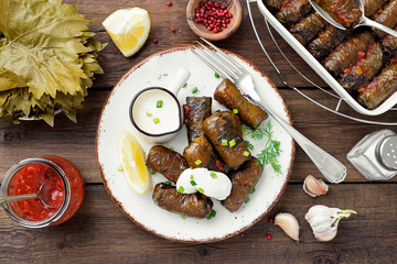 Dolma - stuffed grape leaves with rice and meat. Traditional Turkish and Greek dish