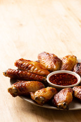 Grilled chicken wings with spicy isaan dipping sauce