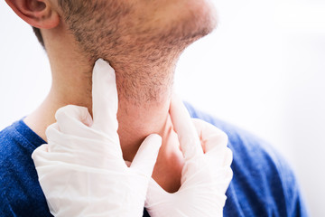 Naklejka premium Man Getting Thyroid Gland Control