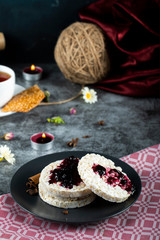 Dietary crackers with red berry jam