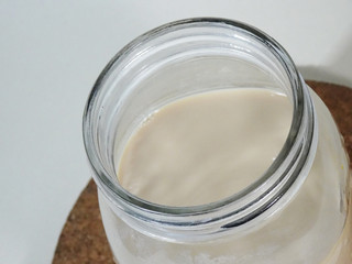 A Glass of Ice Coffee Latte on Cork Coaster