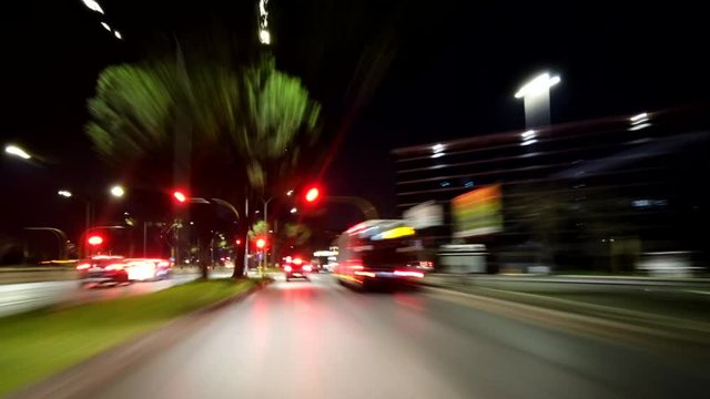 Hyperlapse video in Rome traffic at night,a video shot with poket osmo by a car in traffic in the city of Rome