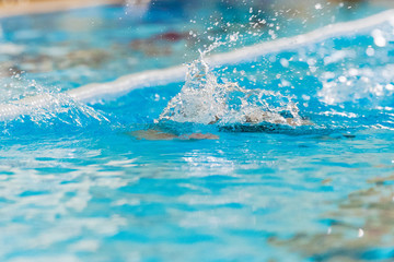 water splashing in swimming pool