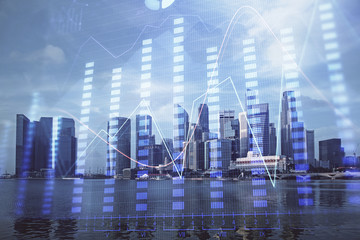 Forex chart on cityscape with tall buildings background multi exposure. Financial research concept.