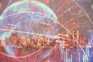 Financial graph on night city scape with tall buildings background double exposure. Analysis concept.