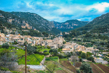Fototapeta na wymiar The village of Valldemossa with the parish church of sant bartomeu, Mallorca, Spain