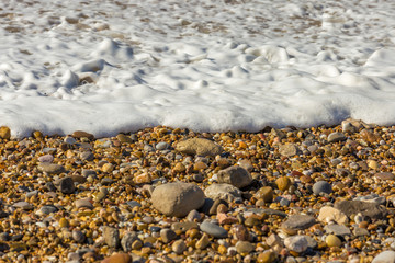 Wave reaching the sand at the beach