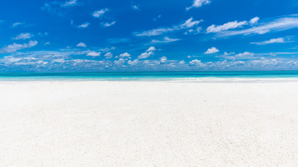 Clean white sand on a blurred background sea ocean sky abstract style