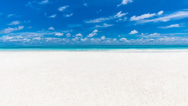 Clean white sand on a blurred background sea ocean sky abstract style