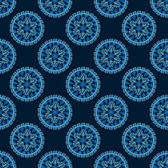 Seamless pattern with Sea Mandala. Stylized corals and algae, stars. Abstract hand drawn illustration isolated on a blue background. Hand - drawn doodles for fabric, paper , and other surfaces. Vector