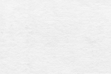 Obraz premium Cardboard white texture close-up. Light old paper background. Grunge concrete wall. Vintage blank wallpaper.