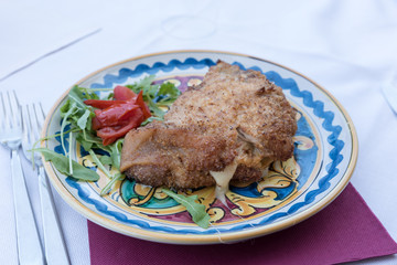 Cutlet with arugula