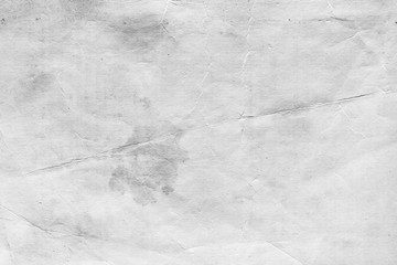 Naklejka premium Cardboard white texture close-up. Light old paper background. Grunge concrete wall. Vintage blank wallpaper.