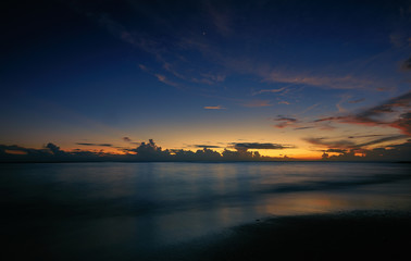Fototapeta na wymiar Sunset on the beach. Paradise beach. Tropical paradise.