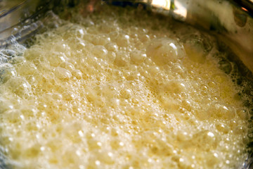 pancake crepe mix inside metal bowl closeup