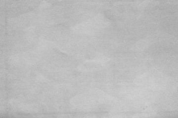 Naklejka premium Cardboard white texture close-up. Light old paper background. Grunge concrete wall. Vintage blank wallpaper.