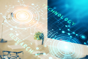 Double exposure of desktop computer and technology theme hologram. Concept of software development.