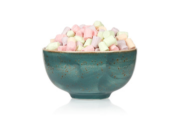 Heap of delicious marshmallows in a bowl, isolated