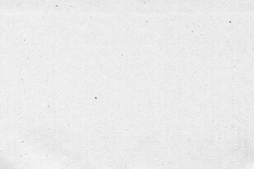 Obraz premium Cardboard white texture close-up. Light old paper background. Grunge concrete wall. Vintage blank wallpaper.