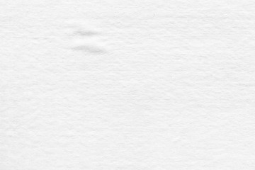 Cardboard white texture close-up. Light old paper background. Grunge concrete wall. Vintage blank wallpaper.