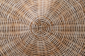 Wicker circular texture of a basket of natural ingredients. Texture and background of wood. Use of natural materials