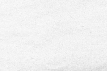 Cardboard white texture close-up. Light old paper background. Grunge concrete wall. Vintage blank wallpaper.