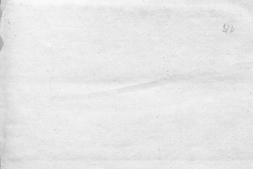 Obraz premium Cardboard white texture close-up. Light old paper background. Grunge concrete wall. Vintage blank wallpaper.