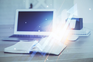 Computer on desktop with point up arrows hologram. Double exposure. Concept of success.