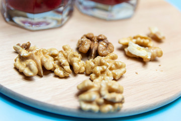 healthy food for the brain walnut slices on a wooden surface