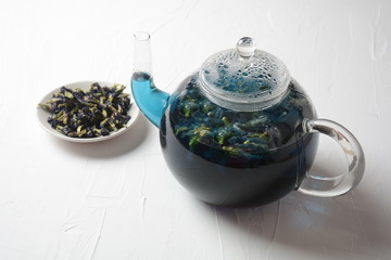 Healthy Blue Butterfly Pea Tea from flowers Clitoria ternatea plant or Asian pegion wings . Detox, antioxidant, anti-stress, anti- ageing beverage popular in Thailand, Vietnam, Bali, Malaysia