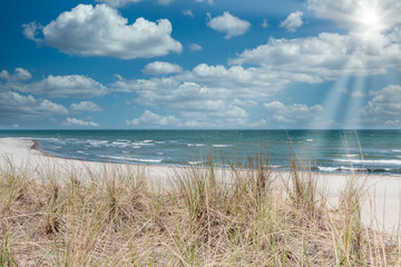 the view over the dune of the Baltic Sea in beautiful weather