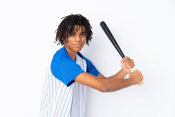 Young African American man playing baseball over isolated white background playing baseball