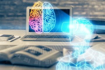 Computer on desktop with AR theme icon. Multi exposure. Concept of augmented reality.