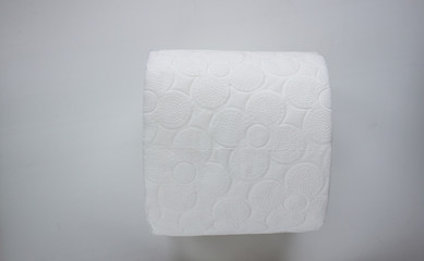 A roll of toilet paper on white background